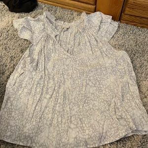 White and grey spotted blouse